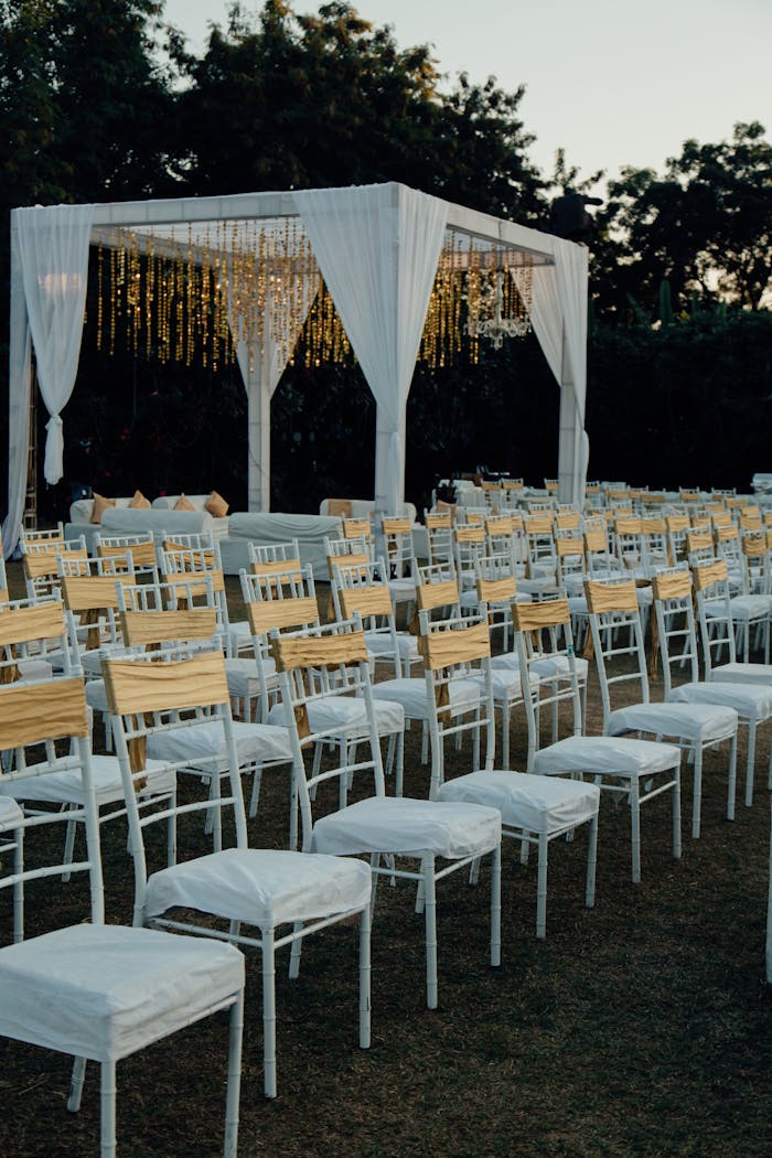elegant-outdoor-wedding-ceremony-setup-at-dusk-33485956